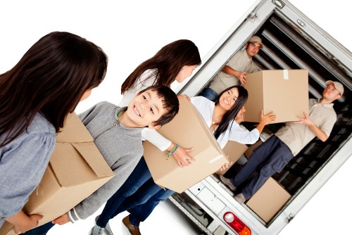 Furniture and boxes ready for transport with a Brixton man and van service