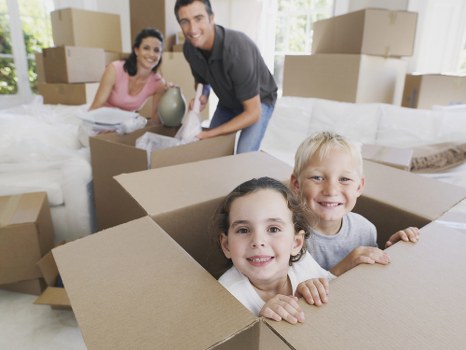 Office removals planning in Brixton with packed boxes and business furniture