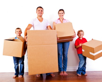 Removals van service operating on a Brixton street with local residential properties