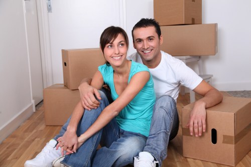 Packed moving boxes ready for Brixton van transport