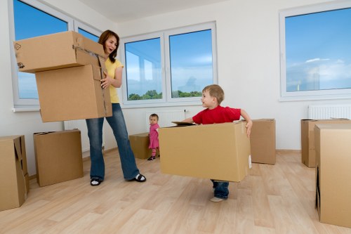 Loading furniture into a van for a Brixton collection and delivery job