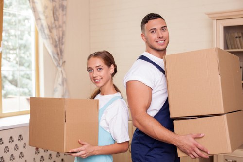 Packed boxes and wrapped furniture ready for local removals